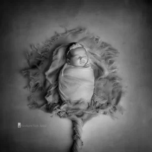 Fotografía del reportaje de seguimiento de bebé recién nacido desde embarazo hasta el primer año.